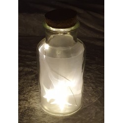 Glas mit Sternenlicht