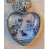 Kette mit Herz Cabochon Wölfe