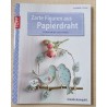 Zarte Figuren aus Papierdraht