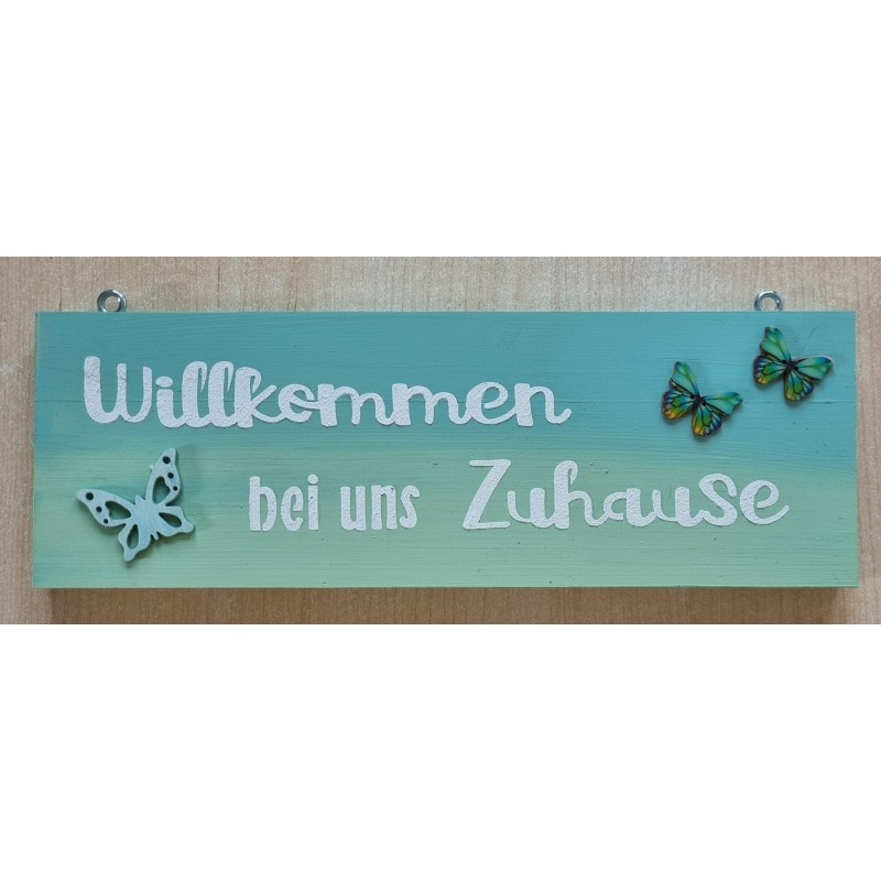 Schild Willkommen bei uns Zuhause  mint