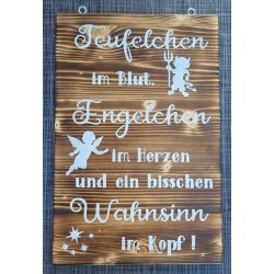 Schild geflammt  " Teufelchen im Blut..."