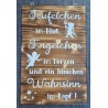Schild geflammt  " Teufelchen im Blut..."