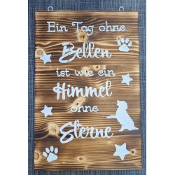 Schild geflammt  " Ein Tag ohne Bellen..."