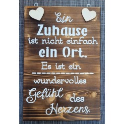 Schild geflammt  " Ein Zuhause..."