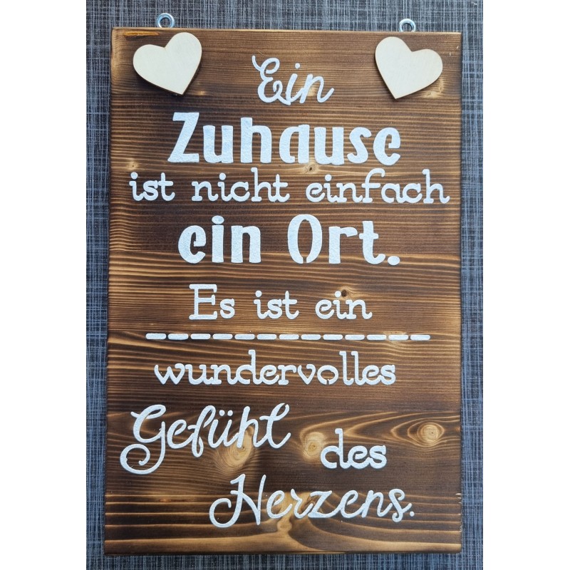 Schild geflammt  " Ein Zuhause..."