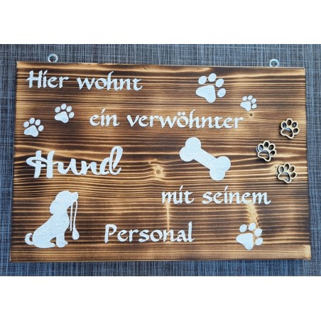 Schild geflammt  " Hier wohnt ein..."
