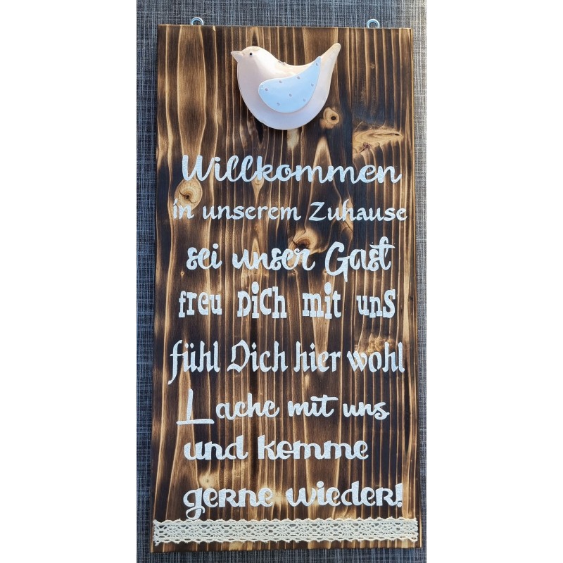 Schild geflammt  " Willkommen..."