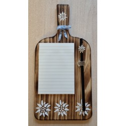Notizblock mit Bleistift auf Holzbrettchen hellblau