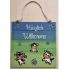 Schild Lustige Kühe "Härzlich Willkomme" grün/blau