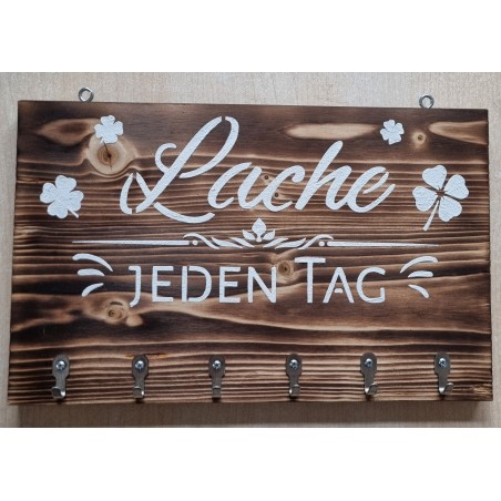 Schlüsselgarderobe " Lache " geflammt