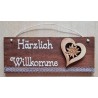 Schild rötlich " Härzlich Willkomme " Holz Herz/Edelweiss