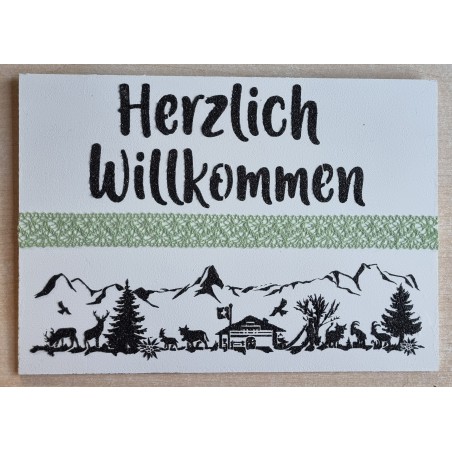Schild weiss/schwarz/hellgrün " Herzlich Willkommen/Alpenfeeling "