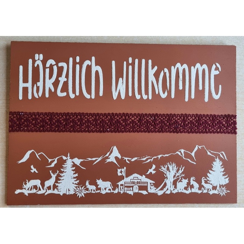 Schild terracotta/weiss/weinrot " Härzlich Willkomme/Alpenfeeling "