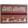 Schild terracotta/weiss/weinrot " Härzlich Willkomme/Alpenfeeling "