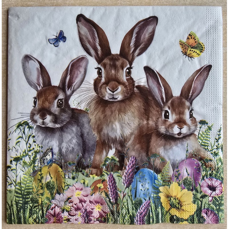 Serviette Drei braune Kaninchen/bunte Eier