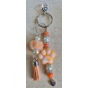 Schlüsselanhänger Pfote orange/weiss
