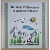 Schild "Herzlich Willkommen"/Hirsche, Berge/grün