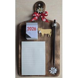Brettchen mit Notizblock/Kalender 2026 und Bleistift rot