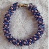 Gefädeltes Armband blau/lila