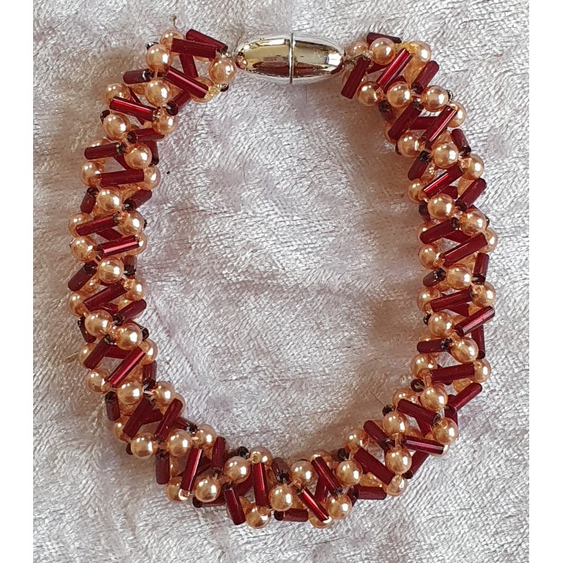 Gefädeltes Armband rot/lachs
